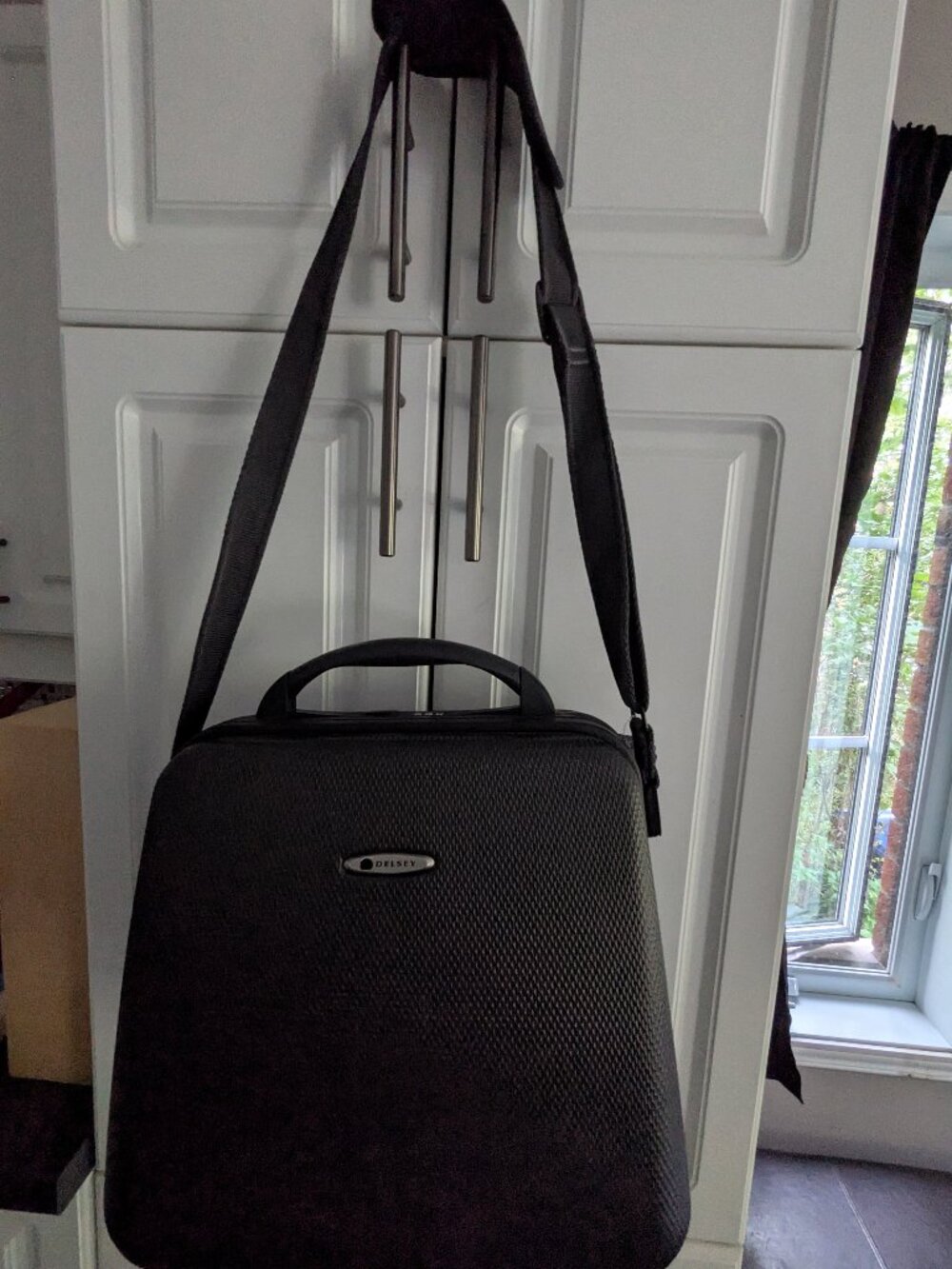 Small Delsey suitcase carry-on